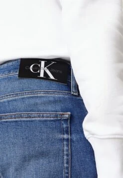 Calvin Klein JeansSLIM - Jeans Slim Fit - Denim Medium -Stilfulla Val Butik 01d050c0ebaf4a42beb1cdfc53ddc3ff