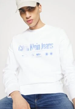 Calvin Klein JeansSLIM - Jeans Slim Fit - Denim Medium -Stilfulla Val Butik 236fafafc7634ee2bff81c96ccd4095d